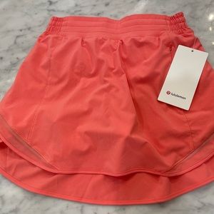 NWT!!! Lululemon Hotty hot skirt in beautiful coral color.